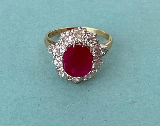 STUNNING VINTAGE LARGE RUBY AND DIAMOND ENGAGEMENT RING