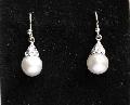 Edwardian Natural Pearl And Diamond Earrings.