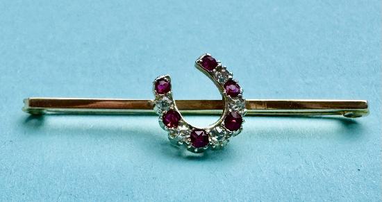 ANTIQUE RUBY AND DIAMOND HORSESHOE BROOCH