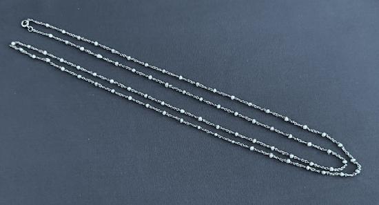 EDWARDIAN PLATINUM AND PEARL LONG GUARD CHAIN. EDWARDIAN PLATINUM AND PEARL LONG GUARD CHAIN.