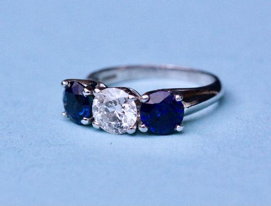LARGE SAPPHIRE AND DIAMOND THREE STONE ENGAGEMENT RING