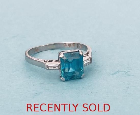 BLUE ZIRCON AND DIAMOND ENGAGEMENT RING
