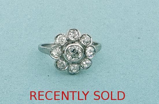 EDWARDIAN PLATINUM DIAMOND DAISY RING EDWARDIAN PLATINUM DIAMOND DAISY RING