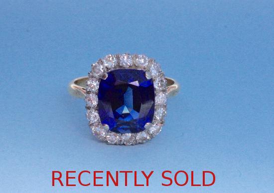 LARGE SYNTHETIC SAPPHIRE AND DIAMOND  CLUSTER  RING