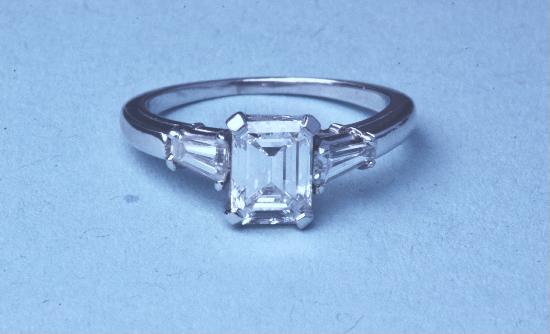 STUNNING EMERALD-CUT DIAMOND ENGAGEMENT RING