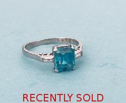 Blue Zircon And Diamond Engagement Ring